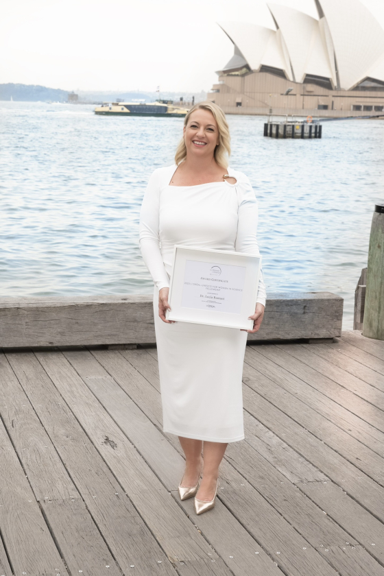 Dr Lucia Romani with her L'Oreal-UNESCO Fellowship award, 20 November 2023. Credit: Esteban La Tessa for L'Oreal Groupe ANZ.