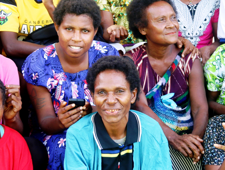 Group of women from Papua New Guinea PNG, village reporters working on informing and recruiting community. Credit: Andrew Vallely