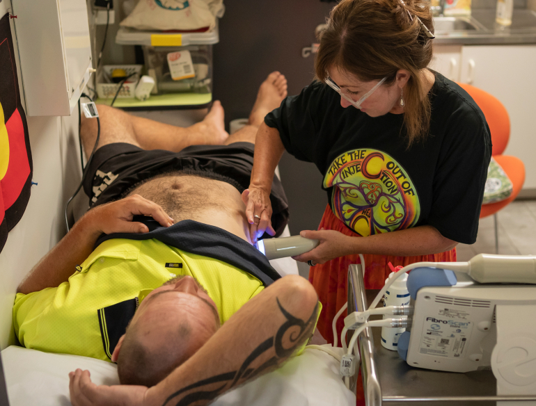 A FibroScan to assess liver fibrosis being performed on a patient in Cairns, Queensland as part of the ETHOS Engage Study. Credit: Conor Ashleigh.