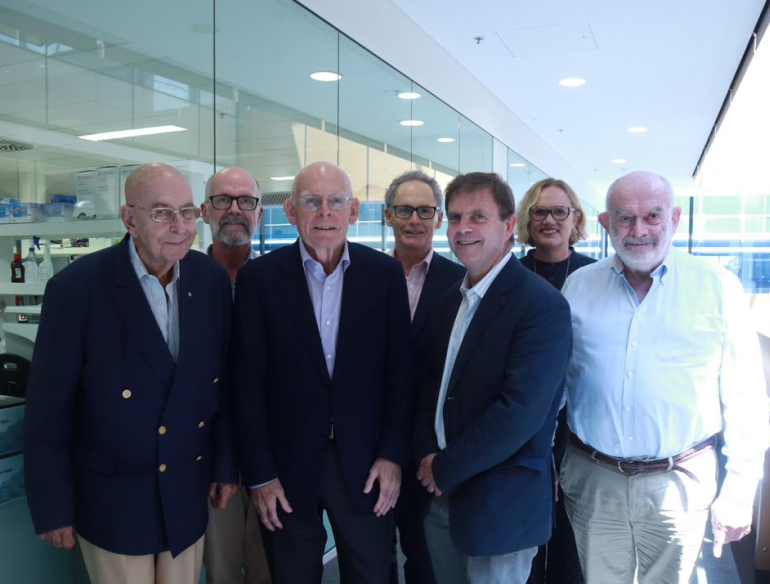 Lord Glendonbrook and members from the Glendonbrook Foundation with Kirby researchers outside the lab.