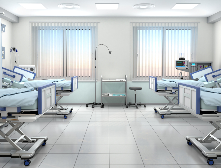 3D illustration of 4 empty beds in a hospital ward. Credit: AdobeStock