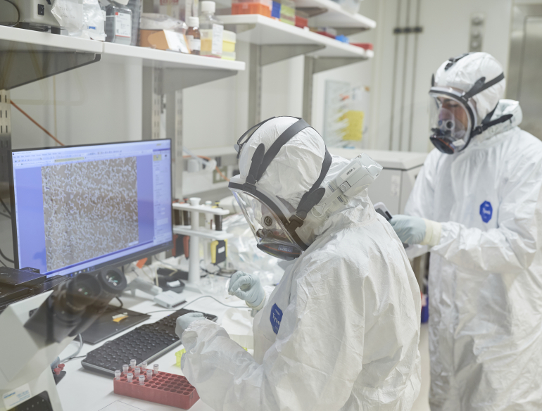 Kirby researchers working on COVID-19 in our PC3 labs. Credit: Richard Freeman/Kirby Institute & UNSW.
