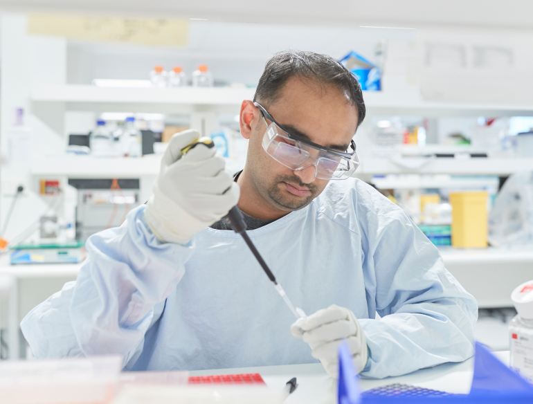 Lab technician pipetting. Credit: UNSW/Richard Freeman