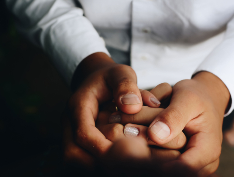 Holding hands bequests. Credit: Unsplash