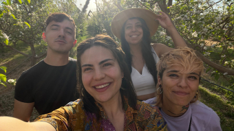 Diverse group of four young people bisexual pansexual bi+ outdoors