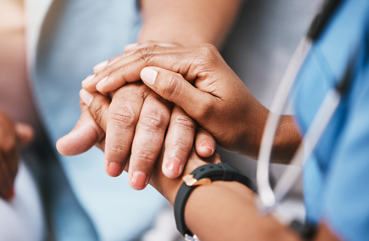 Empathy, trust and nurse holding hands with patient for help, consulting support and healthcare advice. Kindness, counseling and medical therapy in nursing home for hope, consultation and psychology