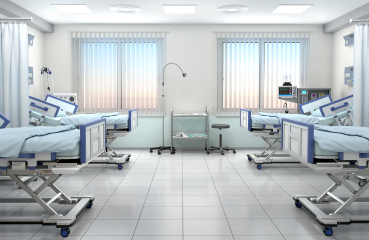 3D illustration of 4 empty beds in a hospital ward. Credit: AdobeStock