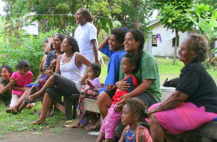 Group of smiling women and children from Solomon Islands. Credit: Flickr/Antony Robinson (CC BY-NC-SA 2.0)